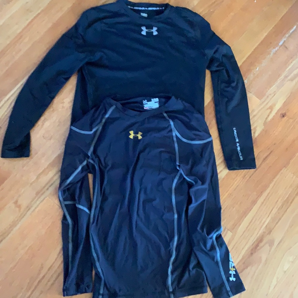 Two under Armour boys dri-fit base layer tops. One is a size large/one XL.